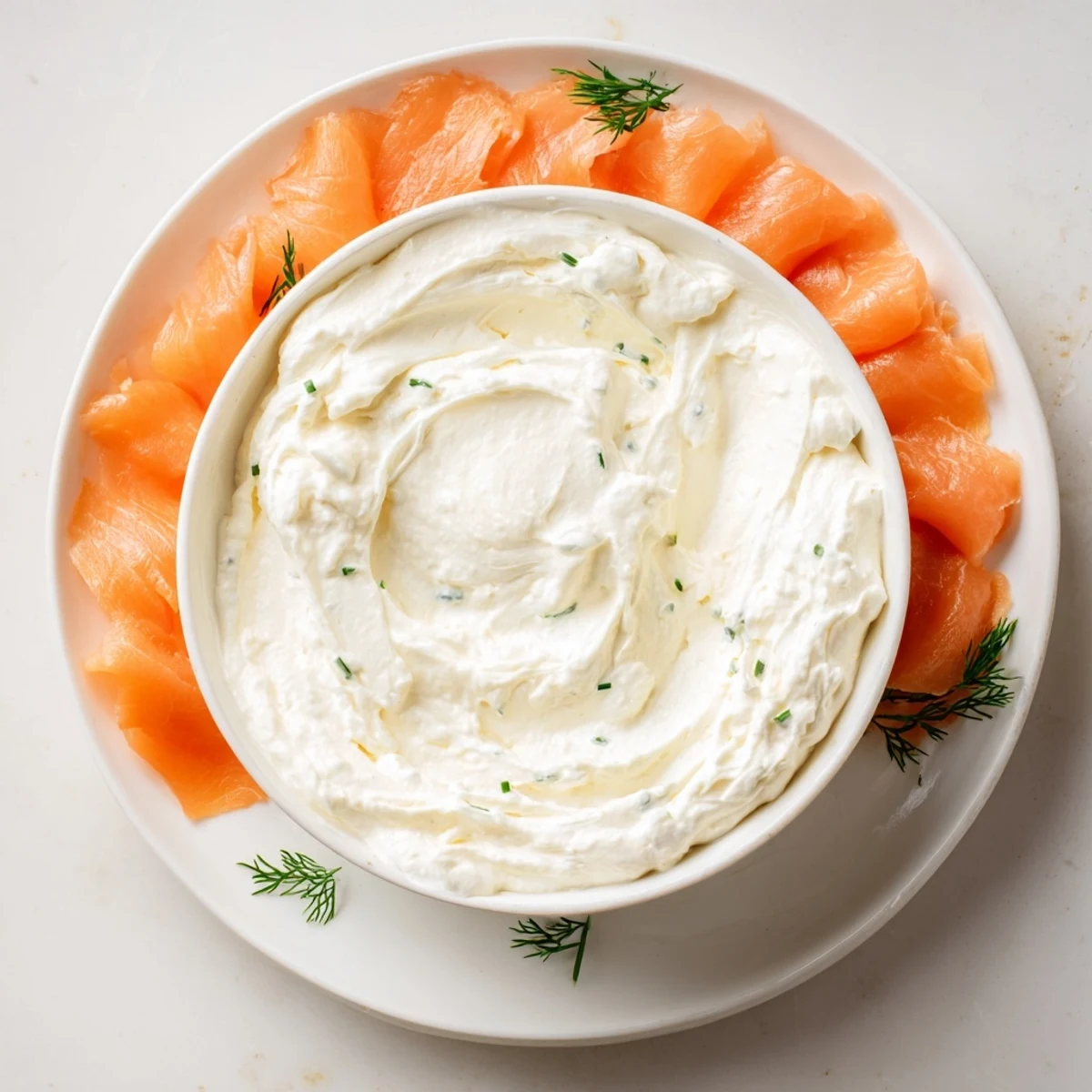A beautiful "Compass Rose" appetizer with colorful meats arranged around a creamy dip.