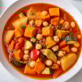 A steaming bowl of comforting Hearty Vegan Sweet Potato Stew, perfect for a cozy, flavorful meal.