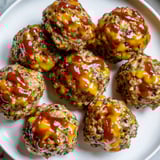 Warm serving of miniature meatloaf bites, baked until golden and ready to be enjoyed.