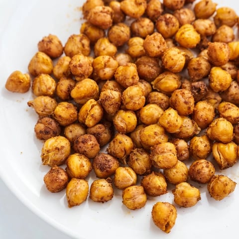 Golden, crispy chickpea snack, perfectly seasoned and ready for a satisfying, healthy crunch.