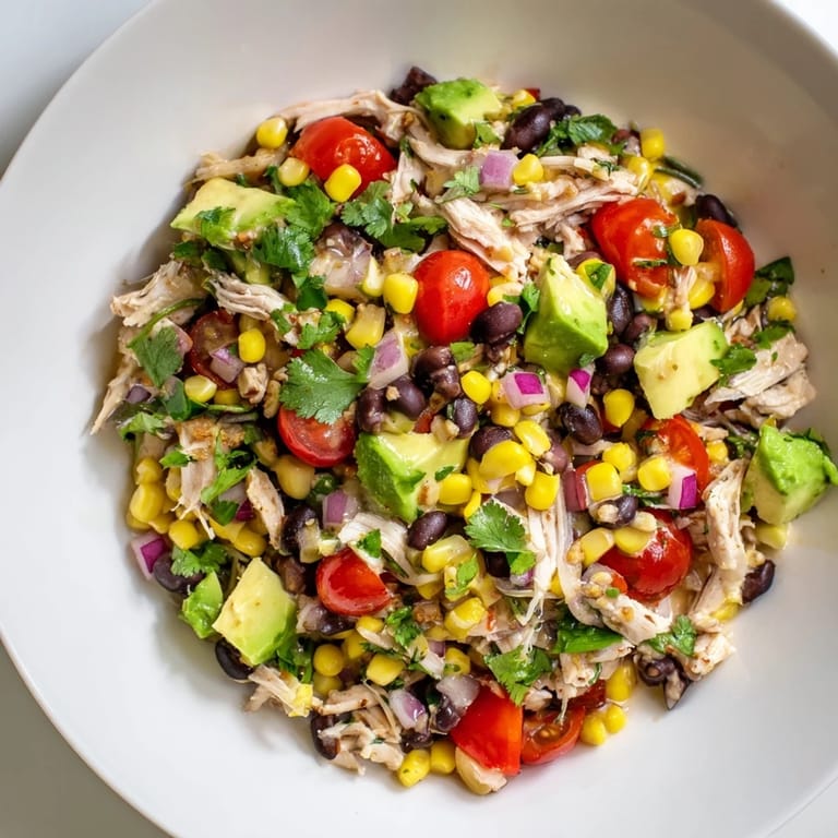 Close up view of the finished Dense Southwestern Bean Salad, perfect for a gathering.